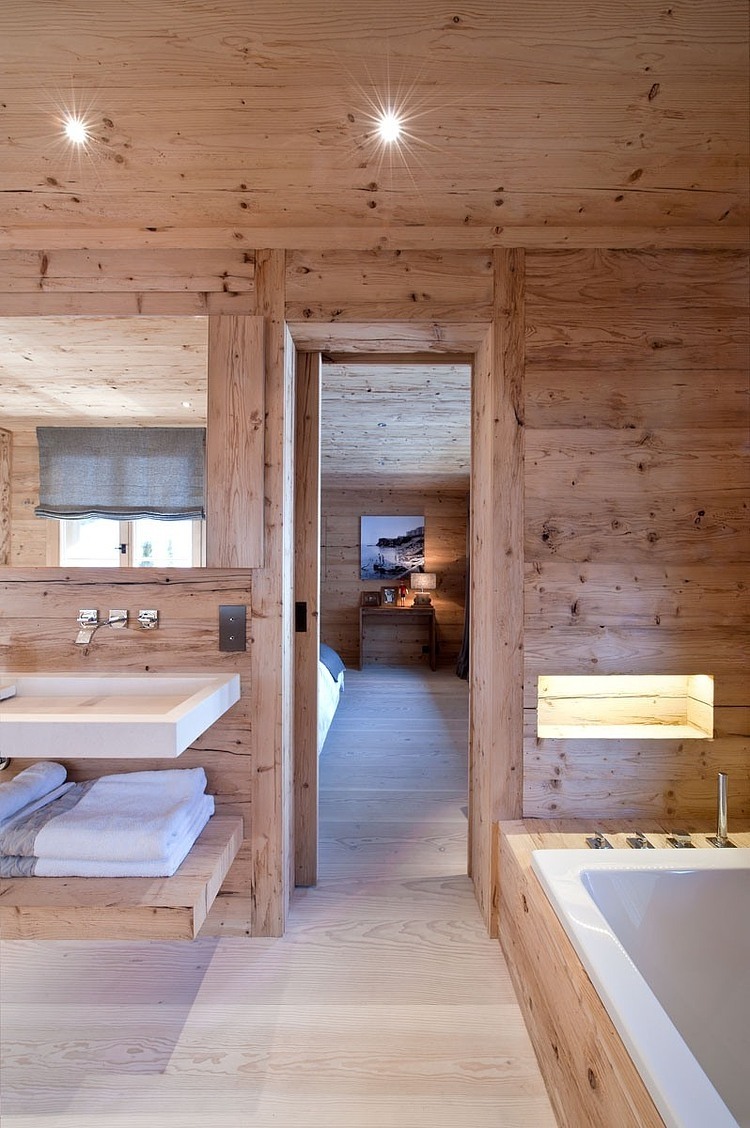 Chalet Gstaad Architectes Warm Chalet Gstaad Amaldi Neder Architectes Master Bathroom With Mounted Tub And Floating Vanity Decoration  Eclectic White Chalet Decoration With Wooden Veneer For Walls