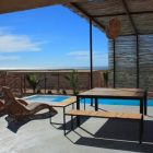 Pergola Made To Webbing Pergola Made Of Woods To Prevent Hot Natural Sunlight Above Outdoor Swimming Pool Of Stunning Santos Dream Homes Stunning Holiday Home With Exquisite Concrete Pools