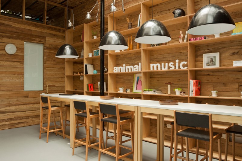 Details In Shelves Wonderful Details In The Wooden Shelves Near Animal Music Studio Sitting Area With Wooden Stools And Wooden Table Decoration  Trendy And Fascinating Office Design Of The Animal Music Project