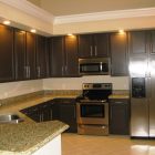 Kitchen Cupboards Dark Wonderful Kitchen Cupboards Paint With Dark Wooden Furniture Combined With Marble Countertop Design In Elegant Interior Style Kitchens Chic Kitchen Cupboards Paint To Live-up Kitchen Interior (+12 New Images)