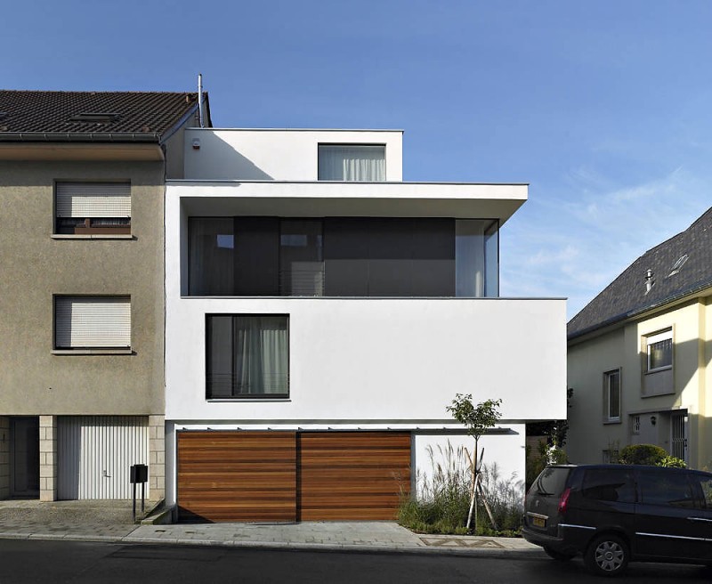 Building Design 0042 Amazing Building Design Of PPLB 0042 Residence With White Concrete Wall And Dark Brown Entrance Gate Made From Wooden Material Dream Homes  Fancy Contemporary Home Using Concrete And Wooden Materials In Luxembourg