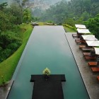 Infinity Swimming A Appealing Infinity Swimming Pool In A Hotel Of Bali Indonesia Displaying Fresh Green Hill And Manicured Lawn Swimming Pool Breathtaking Infinity Pool Design To Make Your Dreams Come True