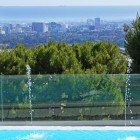 Outdoor Relaxing In Astounding Outdoor Relaxing Space Design In Beverly Hills Mansion With Transparent Glass Handrail And Soft Blue Pool Architecture Stunning Beverly Hills House With Modern Interior Decorating Ideas