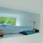 Blue Quilt Cushions Attractive Blue Quilt And Blue Cushions In The Casa Kolonihagen Norway Loft Bed With Wide Glass Window Dream Homes Stunning Holiday House Design As Best Choice For Spending Summer Holiday