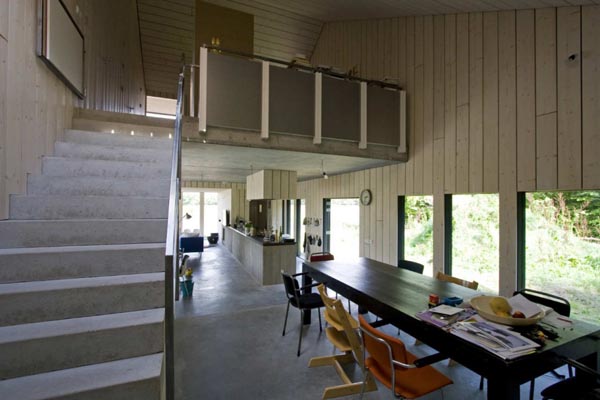 White Marble With Attractive White Marble Constructed Ladder With Iron Railing Beside Black Dining Table And Chairs Inside Chimney House Architecture Elegant Chimney House With Striped Walls And Rectangular Floor Plans