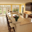 Bright Kitchen With Awesome Bright Kitchen Floor Plans With Islands With Lovely Indoor Plants Padded Bar Stools Dark Wood Kitchen Cabinet Sleek Floor Tile Kitchens Classy Kitchen Floor Plans With Islands In Lovely White Accessories