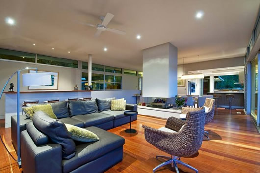 Contemporary Living Decorated Awesome Contemporary Living Room Design Decorated With Black Leather Sectional Sofa And Wicker Egg Chair In Bayview House Decoration Elegant Wood Clad House Design Blending From Modern Elements