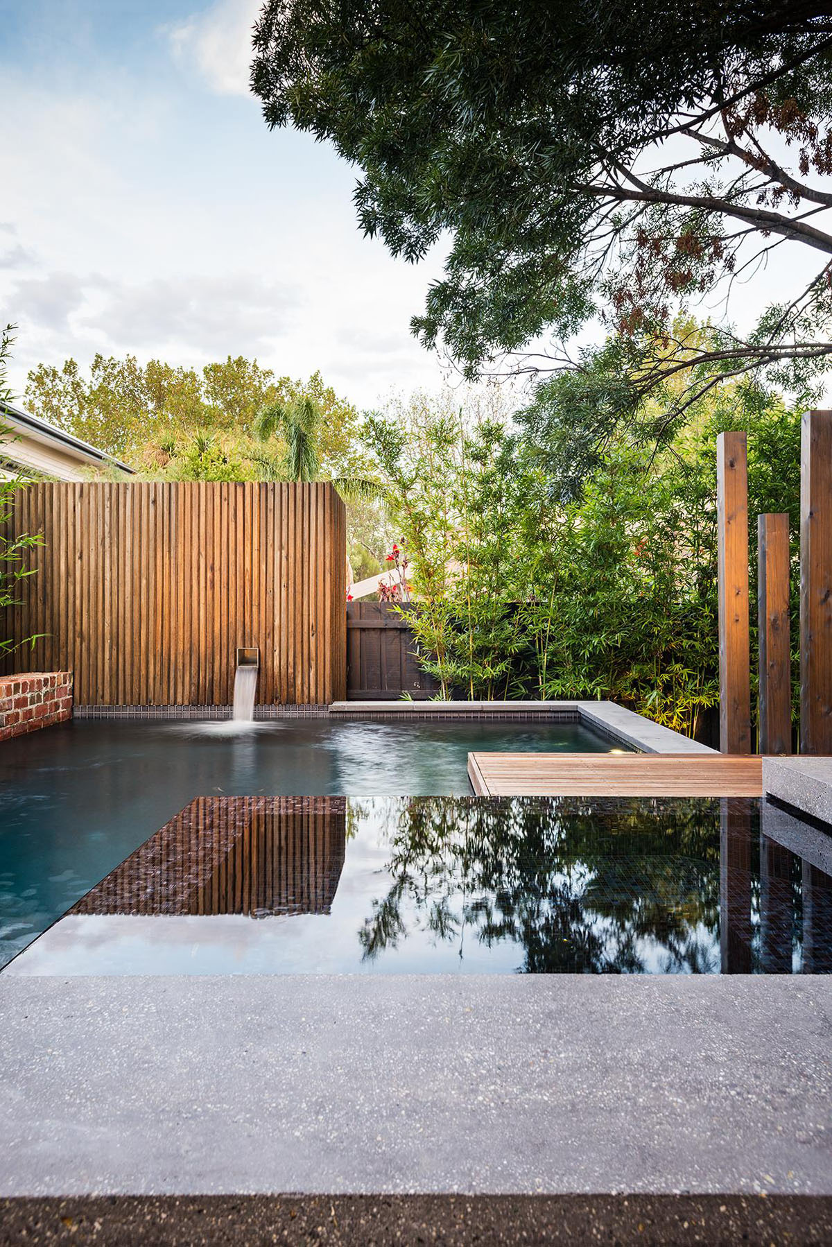 Design Of Backyard Awesome Design Of Maroon Modern Backyard Project With Swimming Pool With Wood Fence And Leafy Tree Decoration  Beautiful Modern Backyard Ideas To Relax You At Charming Home