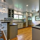 Kitchen Design Cabinet Awesome Kitchen Design With Grey Cabinet And Chevron Tile Backsplash At Modern Ranch House With Chrome Stools Decoration Stylish Modern Ranch Home Interior In Bright Color Decoration