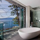 Lake View Classy Awesome Lake View From Adorable Classy Pender Harbour House Transparent Glass Railing Porcelain White Bathtub Concrete Deck Small Shower Cabin Architecture Stunning Waterfront House With Lush Forest Landscape