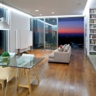 Living Room Clutter Awesome Living Room Inside Artistic Clutter House Furnished Glass Living Desk With White Single Chairs And Iron Modular Shelves Decoration Surprising Home Decoration With An Open Landscape Of Seaside Views