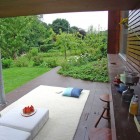 White Rug Brown Awesome White Rug On The Brown Terrace Outside The Casa Kolonihagen Norway With White Lathers And Wooden Stools Dream Homes Stunning Holiday House Design As Best Choice For Spending Summer Holiday