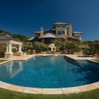 Backyard Landscape Shocked Beautiful Backyard Landscape With Recently Shocked Pool Round Shape With Granite Liner That Surrounded By Green Lawn Swimming Pool Amazing Cool Swimming Pool Bringing Beautiful Exterior Style