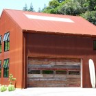 Maroon Themed Garage Beautiful Maroon Themed Aptos Retreat Garage Idea Designed With Double Floor Setting And Large Door With Glass Dream Homes Elegant Modern Family Retreat With Cozy Red Kitchen Colors