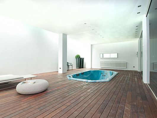 Bath Tub Laminate Blue Bath Tub Embedded On Laminate Wood Floors Of Contemporary Bathroom In Sleek White Contemporary Villa In Madrid Apartments Sophisticated Scandinavian Living Rooms As Inspirational Design For You