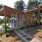 Round Shaped Neatly Challenging Round Shaped Pathway Installed Neatly On The Ground To Enhance Aptos Retreat Exterior Landscape Dream Homes Elegant Modern Family Retreat With Cozy Red Kitchen Colors