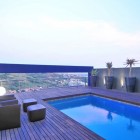 Blue Sky Swimming Charming Blue Sky Views From Swimming Pool Beautified With Double Lounge And Foot Rest In House Tat Residence Dream Homes Picturesque Art Decor In The Modern House With Breathtaking City Scenery