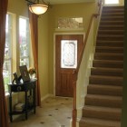 Foyer Design Styled Charming Foyer Design With Classic Styled Pendant Lamp Above Tiled Floor Beside Staircase Completed Wooden Cabinets Decoration Creative Home Interior In Various Foyer Appearances