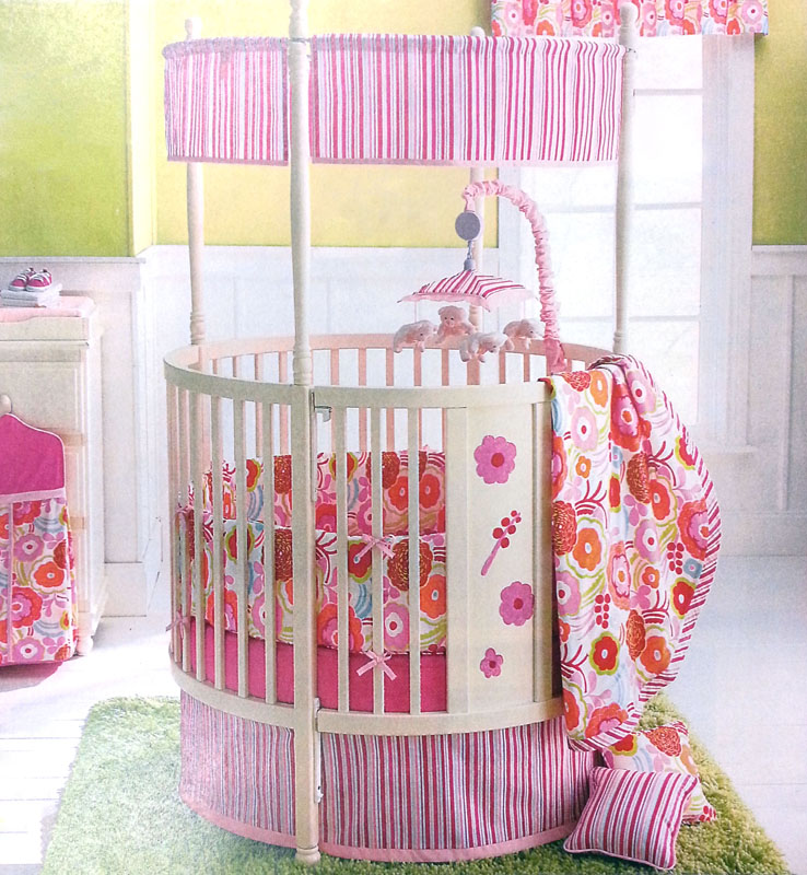Baby Girl Crib Chic Baby Girl Themed Round Crib With Colorful Flowers Attached As Pattern Over The Mattress And Blanket Kids Room Adorable Round Crib Decorated By Vintage Ornaments In Small Room