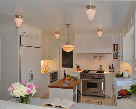 Kitchen With Island Classic Kitchen With Small Kitchen Island Ideas And Antique Pendant Lights Sophisticated Kitchen Appliances Lovely Colorful Flowers White Kitchen Backsplash Kitchens  Elegant Small Kitchen Island Ideas To Grant A Fancy Dishing Spot