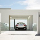 White Themed With Clean White Themed Garage Designs With Glass Windows And White Wall Beautified With Green Plants Outside The Garage Decoration Smart Garage Design In Various Decoration Ideas And Themes