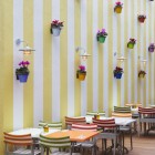 Wall Design Decorated Colorful Wall Design With Lamps Decorated Feat Flowers In Mama Shelter Istanbul Residence Above Chairs Feat Table Decoration Fancy Interior Decorating Ideas In Modern Hotel Of Eurasian City