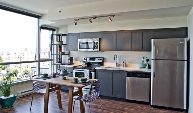 Kitchen Interior Black Contemporary Kitchen Interior Design With Black Painted Kitchen Cabinet And Metal Refrigerator Also Wooden Kitchen Table Kitchens Colorful Kitchen Cabinets For Eye Catching Paint Colors