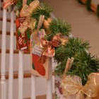 Diy Staircase Idea Creative DIY Staircase Christmas Decor Idea Involving Green Grasses Golden Ribbon And Wishing Lists Or Greeting Card Decoration Magnificent Christmas Decorations On The Staircase Railing