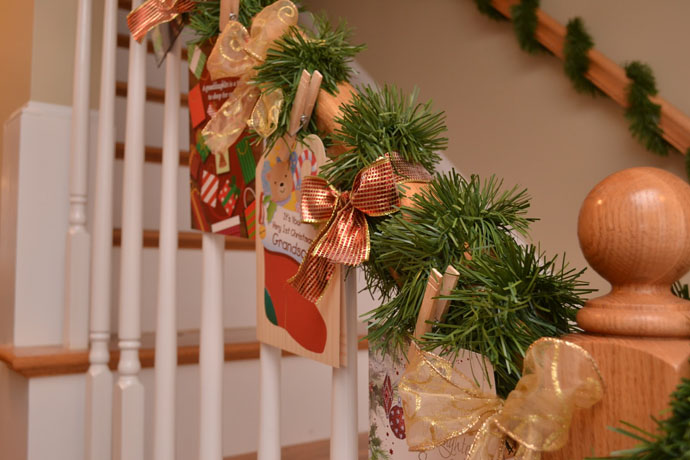 Diy Staircase Idea Creative DIY Staircase Christmas Decor Idea Involving Green Grasses Golden Ribbon And Wishing Lists Or Greeting Card Decoration  Magnificent Christmas Decorations On The Staircase Railing