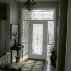 Foyer Interior Entrance Exciting Foyer Interior Ideas In Entrance With White Wooden Glass Windows And Doors Involved Classic Style Pendant Light Decoration Creative Home Interior In Various Foyer Appearances