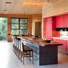 Catching Built Red Eye Catching Built In Wall Red I Shaped Kitchen Unit Coupled With Dark Island And Chairs For Aptos Retreat Interior Dream Homes Elegant Modern Family Retreat With Cozy Red Kitchen Colors