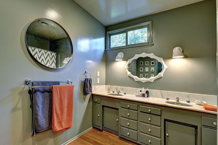 Bathroom Design Wall Fabulous Bathroom Design With Circular Wall Mirror And Green Vanity Ideas At Modern Ranch House Applied Metal Towel Bar Decoration Stylish Modern Ranch Home Interior In Bright Color Decoration