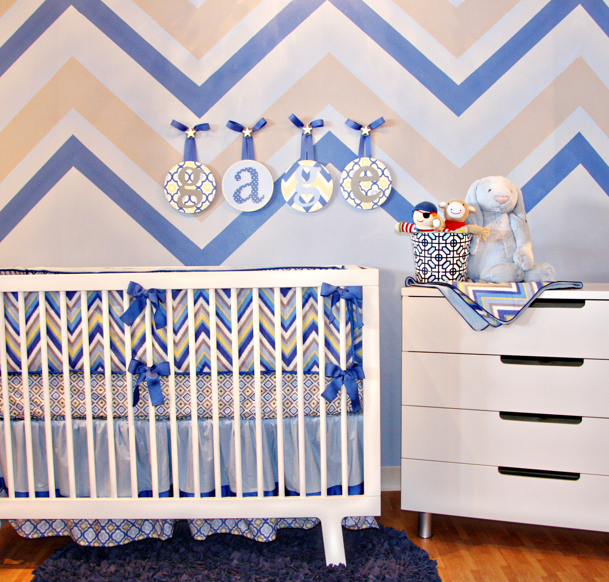 Zigzag Patterned Modern Fabulous Zigzag Patterned Linen Of Modern Crib Bedding And Wallpaper Attached As Focal Point In Baby Room Kids Room  Inspirational Modern Crib Bedding With Lovely Color Combination