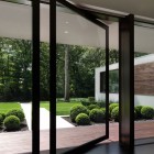 Wooden Glass The Fantastic Wooden Glass Doors In The Wooden Striped Floor And Wooden Pillars Of The New Canaan Residence Dream Homes Charming Modern House With Beautiful Courtyard And Structures