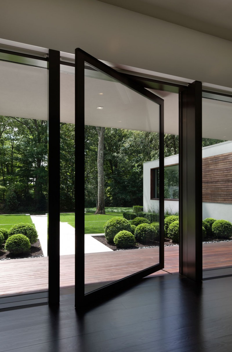 Wooden Glass The Fantastic Wooden Glass Doors In The Wooden Striped Floor And Wooden Pillars Of The New Canaan Residence Dream Homes  Charming Modern House With Beautiful Courtyard And Structures