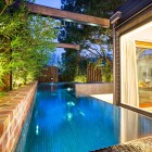 Swimming Pool Glass Fascinating Swimming Pool Design With Glass Tile Also Exposed Brick Wall At Maroon Modern Backyard Project Decoration Beautiful Modern Backyard Ideas To Relax You At Charming Home