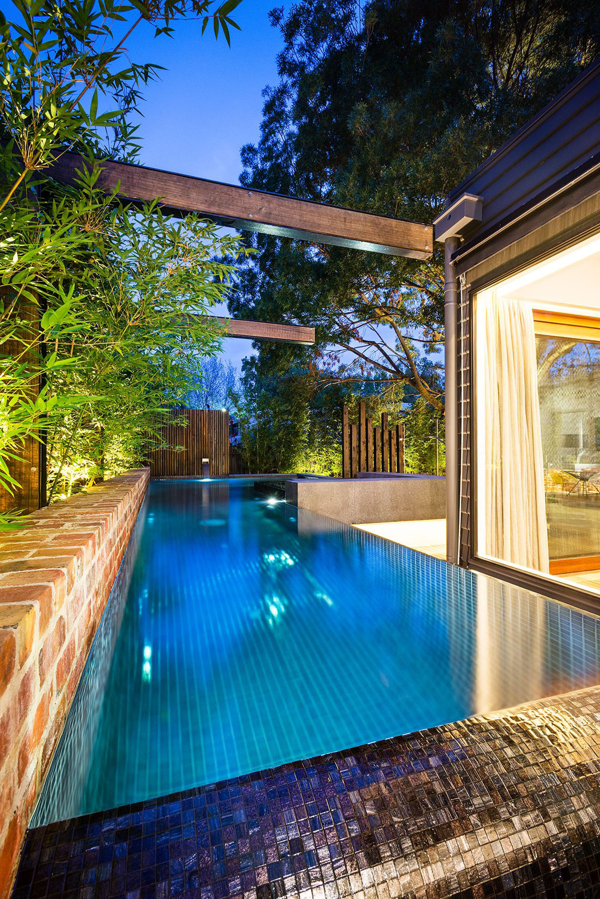 Swimming Pool Glass Fascinating Swimming Pool Design With Glass Tile Also Exposed Brick Wall At Maroon Modern Backyard Project Decoration  Beautiful Modern Backyard Ideas To Relax You At Charming Home