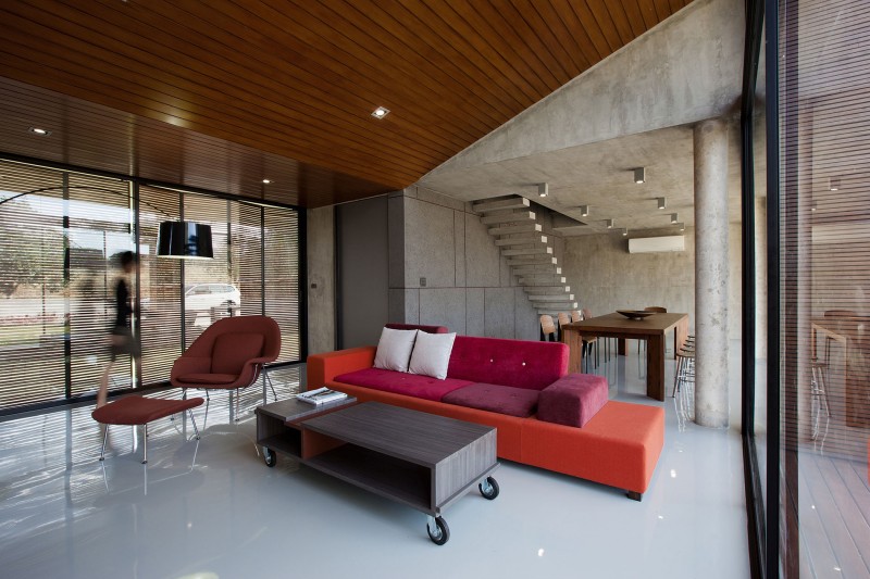 Red Bed Compact Flashy Red Bed Sofa And Compact Shaped Coffee Table With Small Caster Glass Wall Dark Arched Lamp Sleek Laminate Flooring In W House Architecture Elegant Concrete Home With Spacious And Modern Style In Thailand