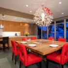 Red Padded Wood Flashy Red Padded Bar Stools Square Wood Dining Table Concrete Floor Lacquered Wood Kitchen Cabinet Shiny Pendant Lights Dark Bar Stools In Pender Harbour House Architecture Stunning Waterfront House With Lush Forest Landscape