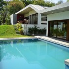 Blue Water The Fresh Blue Water Filled In The In Ground Swimming Pool To Enhance The House Exterior Landscaping Idea With Lounge Dream Homes Cozy Single Story House With Open Concept Kitchen And Living Rooms