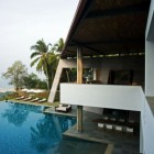 Pool Area And Fresh Pool Area With Loungers And Umbrella Also From Faraway View At The Beautiful Cliff House Area Dream Homes Spectacular Modern Cliff House With Great Open Infinity Pools