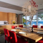 Pendant Light Wood Gorgeous Pendant Light Above Lacquered Wood Dining Table Glossy Red Padded Chairs Wood Kitchen Cabinet Precious Fake Flower In Pender Harbour House Architecture Stunning Waterfront House With Lush Forest Landscape