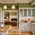 Wall In Furnishing Green Wall In Wooden Cabinets Furnishing That Pendant Lamp Above Stove Beside The Spoon And Fruits Also Kitchens Candid Kitchen Cabinet Design In Luminous Contemporary Style