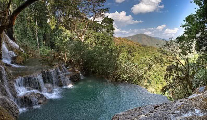 River Styled Pool Ingenious River Styled Infinity Swimming Pool With Natural Waterfall Overlooking Hill And Lush Vegetation In Forest Swimming Pool Breathtaking Infinity Pool Design To Make Your Dreams Come True