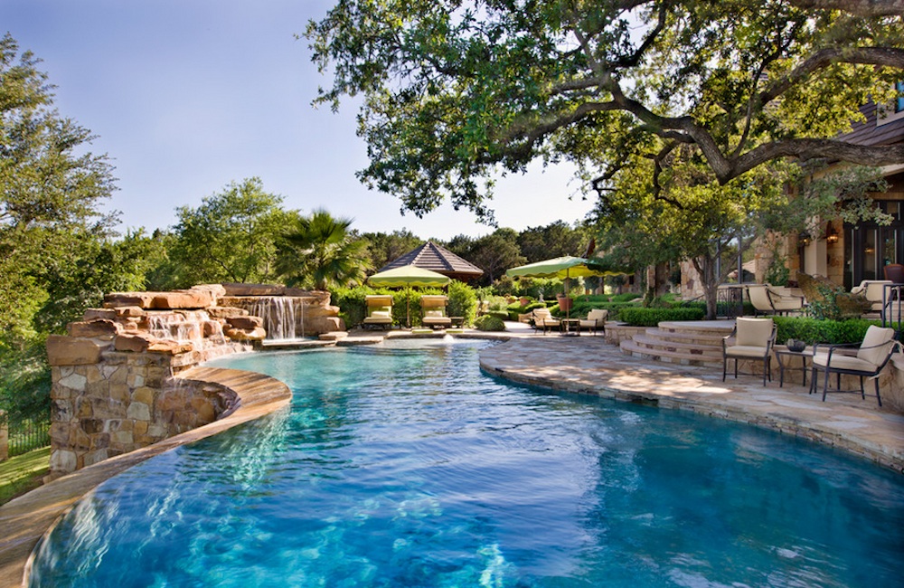 Pool Area Stone Lavish Pool Area Design With Stone And Waterfall That Looks Naturally Add Leafy Tree And Green Vegetation Swimming Pool Amazing Cool Swimming Pool Bringing Beautiful Exterior Style