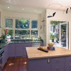 Purple Painted At Lovely Purple Painted Kitchen Cabinet At Eclectic Kitchen Interior With Small Island Applied Granite Countertop Ideas Kitchens Colorful Kitchen Cabinets For Eye Catching Paint Colors