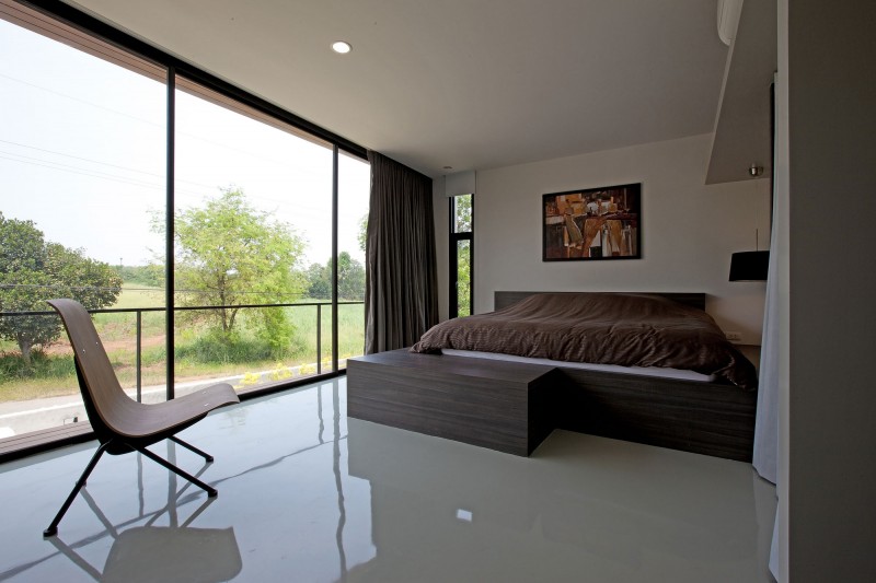 W House Sleek Luxurious W House Interior With Sleek Laminate Flooring Cool Wood Chair Stylish Bed With Warm Quilt Artistic Painting Glass Wall Architecture  Elegant Concrete Home With Spacious And Modern Style In Thailand