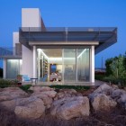 White Wooden And Mesmerizing White Wooden Glass Windows And Glass Sliding Doors Installed On The White Painted Wall Of Artistic Clutter House Decoration Surprising Home Decoration With An Open Landscape Of Seaside Views