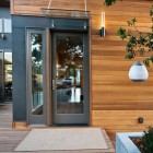 Breeze House Displaying Minimalist Breeze House Entrance Idea Displaying Dark Grey Painted Glass Door And Window To Hit Wood Abundance Architecture Elegant Spacious Home With Wooden Material And Bright Interior Themes