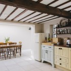 Farmhouse Kitchen Ceiling Modern Farmhouse Kitchen With Beams Ceiling And Cream Kitchen Cupboards Paint Applied Hanging Storage And Dark Top Counter Kitchens Fantastic Kitchen Cupboards Paint Ideas With Chic Cupboards Arrangements